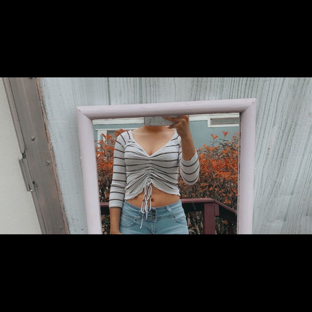 A white crop shirt
